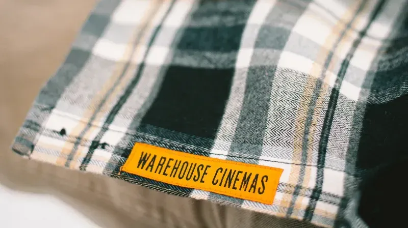 Warehouse Cinemas Woven Patch Woven Interior Label Woven Clamp Tag Embroidery Flannel Shirt by Anthem Branding 1