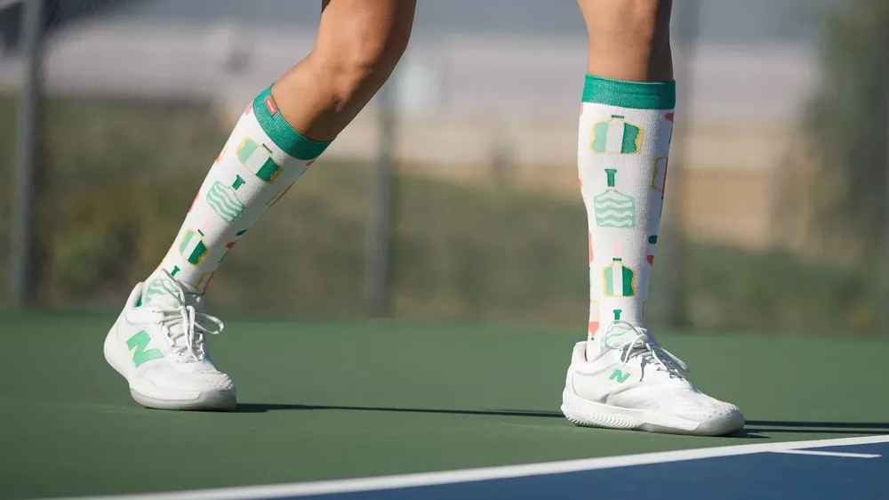 Pickleball pattern compression socks on pickleball court
