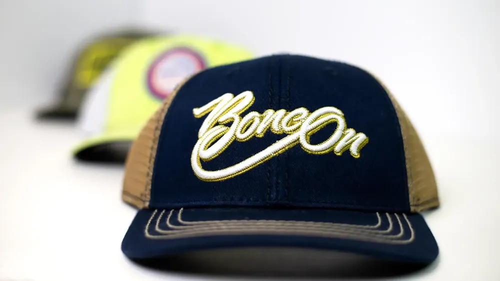 Bone On Sportswear Embroidered Logo Trucker Hat by Anthem Branding
