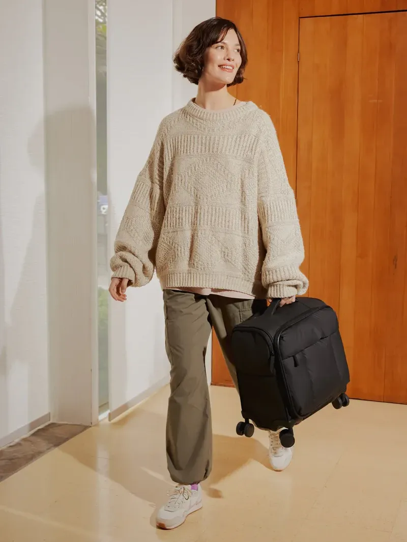 LUKA MINI CARRY ON LUGGAGE BLACK LIFESTYLE2 7afeb9b1 b631 4c33 8450 d282e9cd97d4