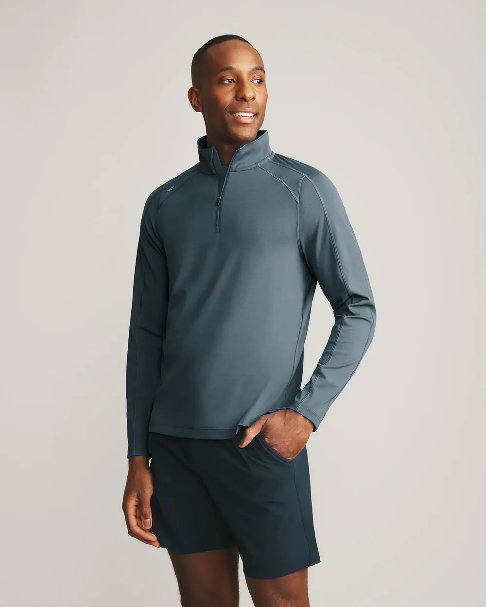 Rhone rise quarter zip by anthem branding