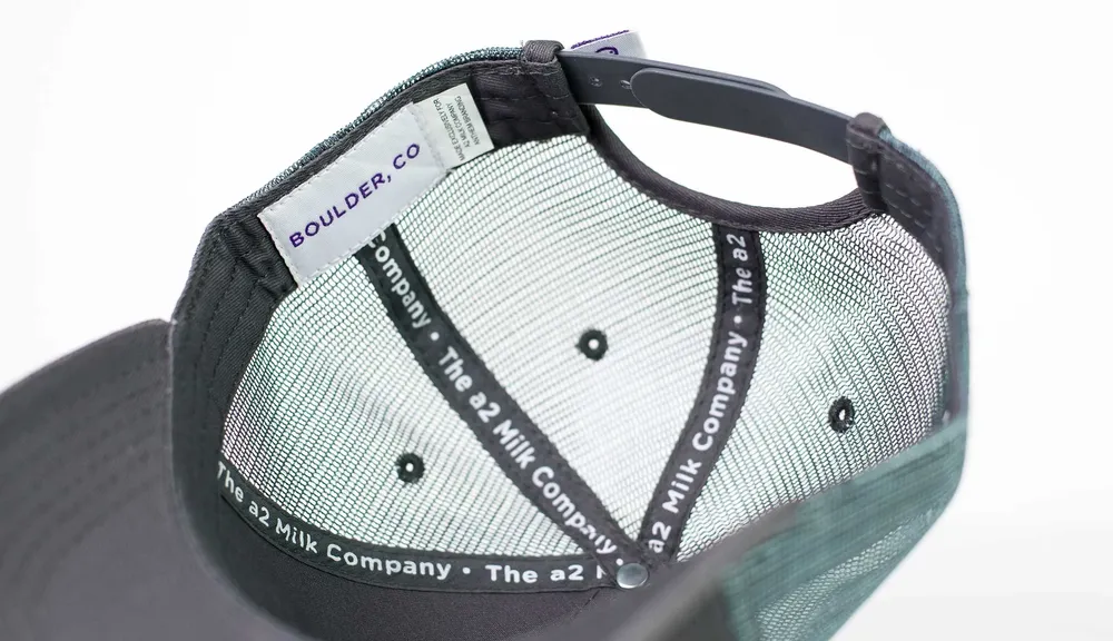 A2 Curved Brim Mesh Trucker Hat Interior Underbrim by Anthem Branding