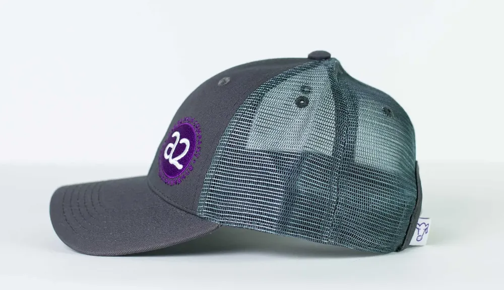 A2 Curved Brim Mesh Trucker Hat Left Side by Anthem Branding