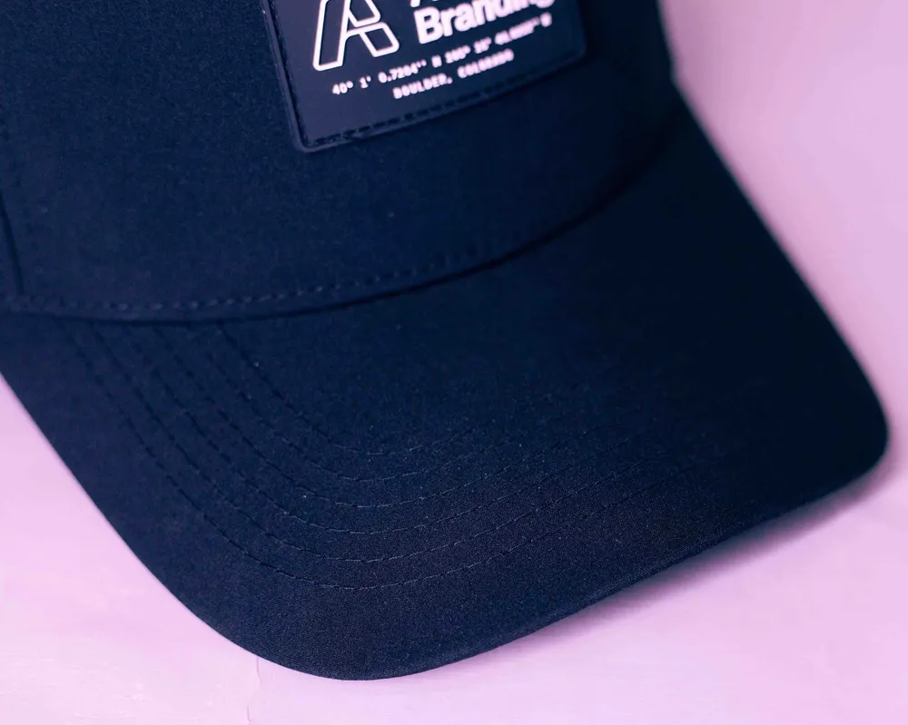 Anthem Branding custom 5 panel performance hat interior taping by anthem branding curved brim