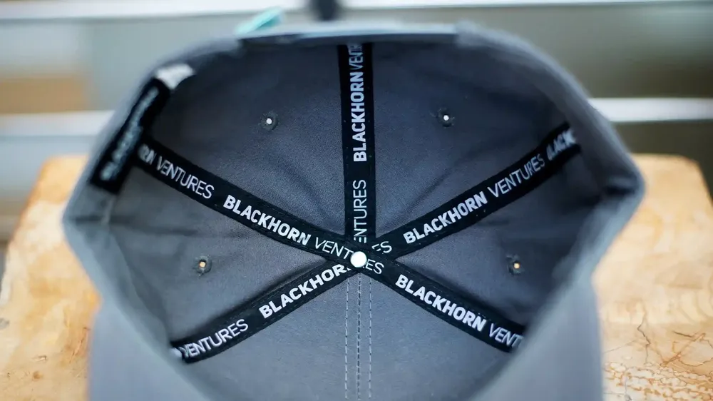 Blackhorn Ventures Trucker Hat Interior Taping by Anthem Branding