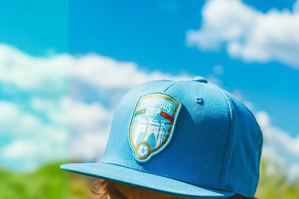 Columbus Cup Brooklyn Italians full fabric flat brim trucker hat by Anthem Branding 1