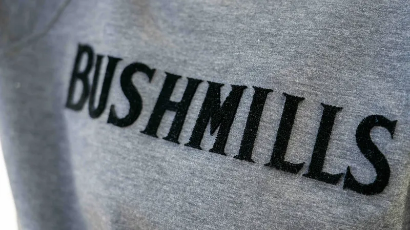 Bushmills chenille applique fabric appliqué lettering crew neck