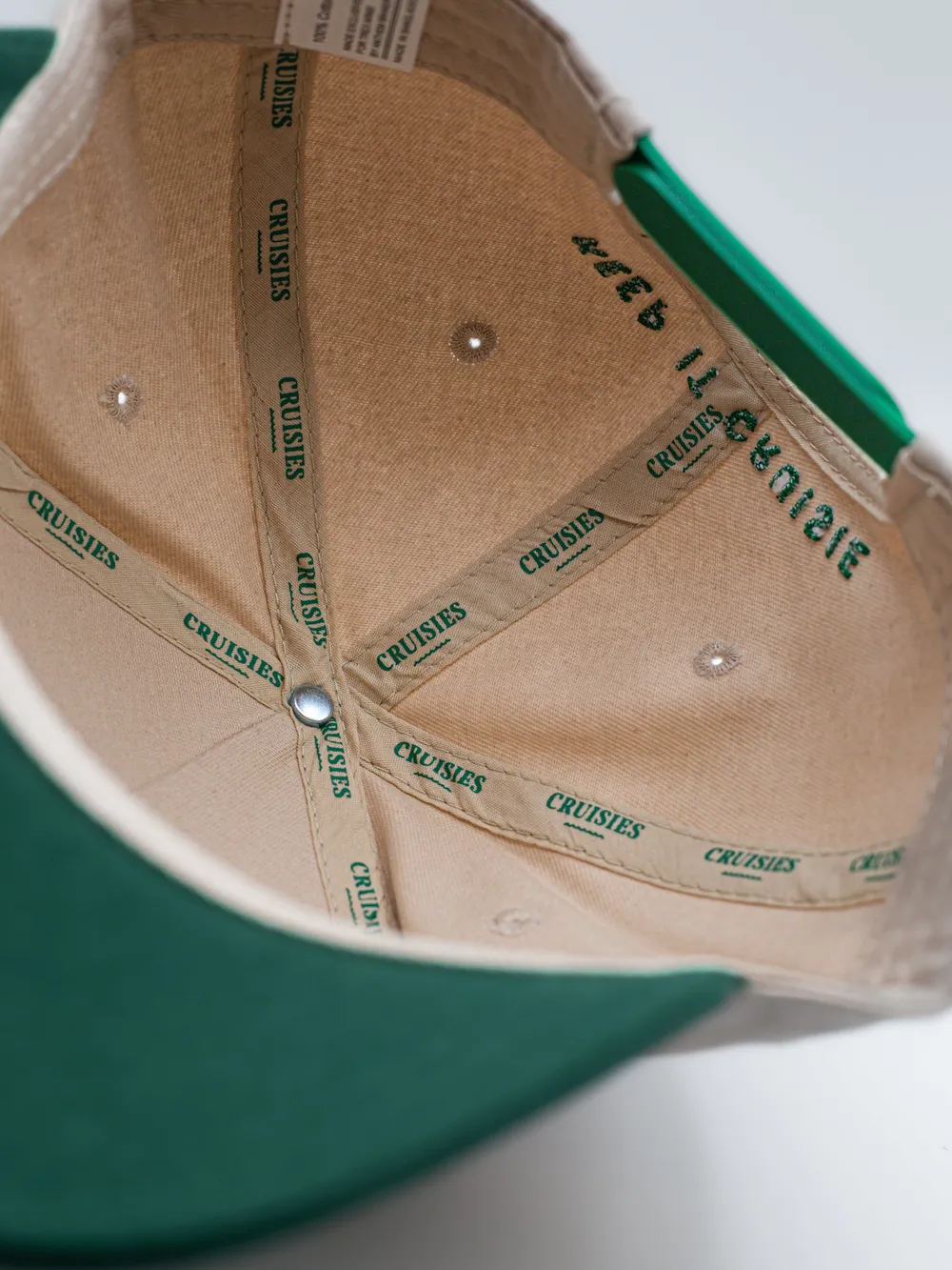 Cruisies full twill green trucker hat by anthem branding 2