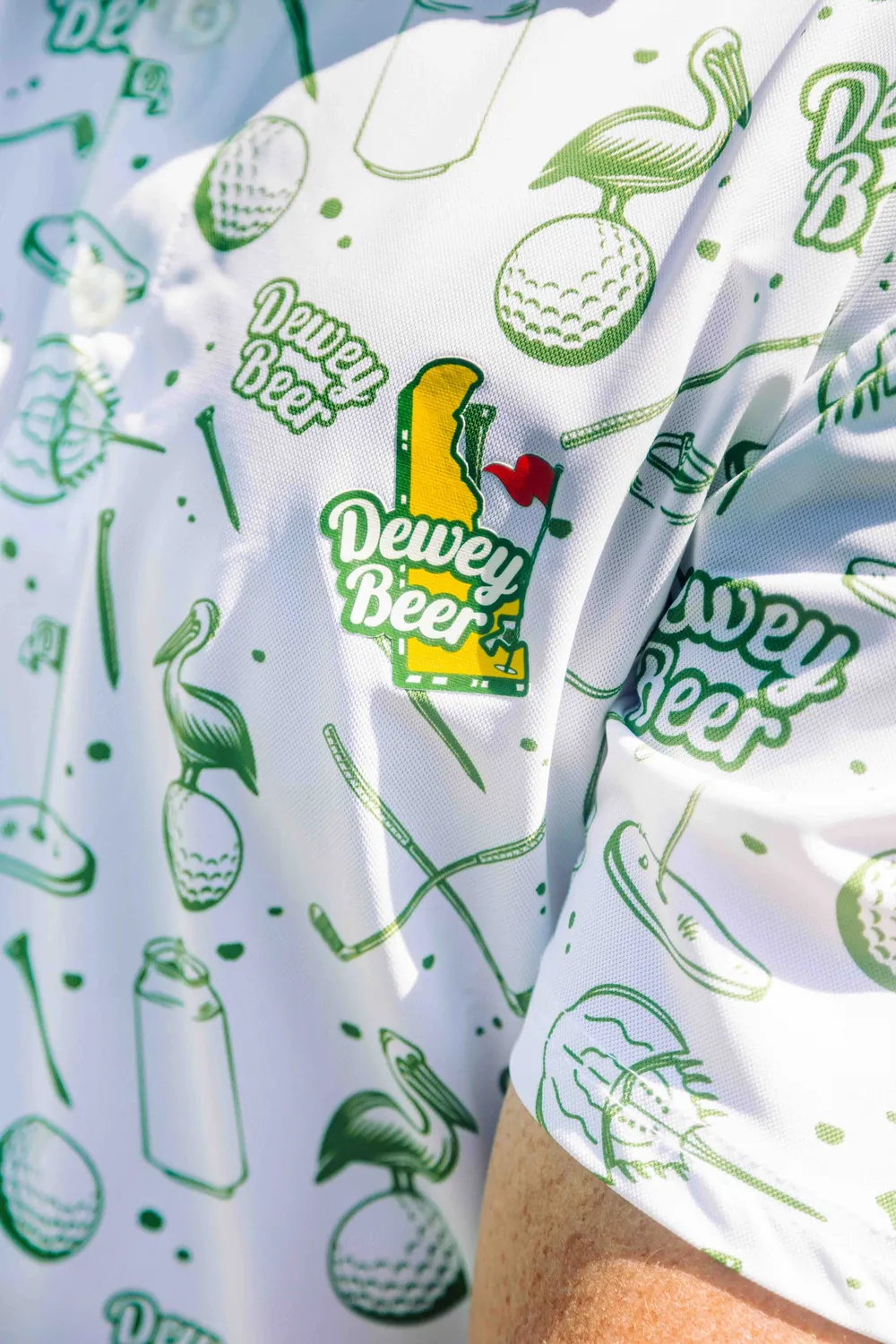 Dewey beer custom golf polo detail by anthem branding