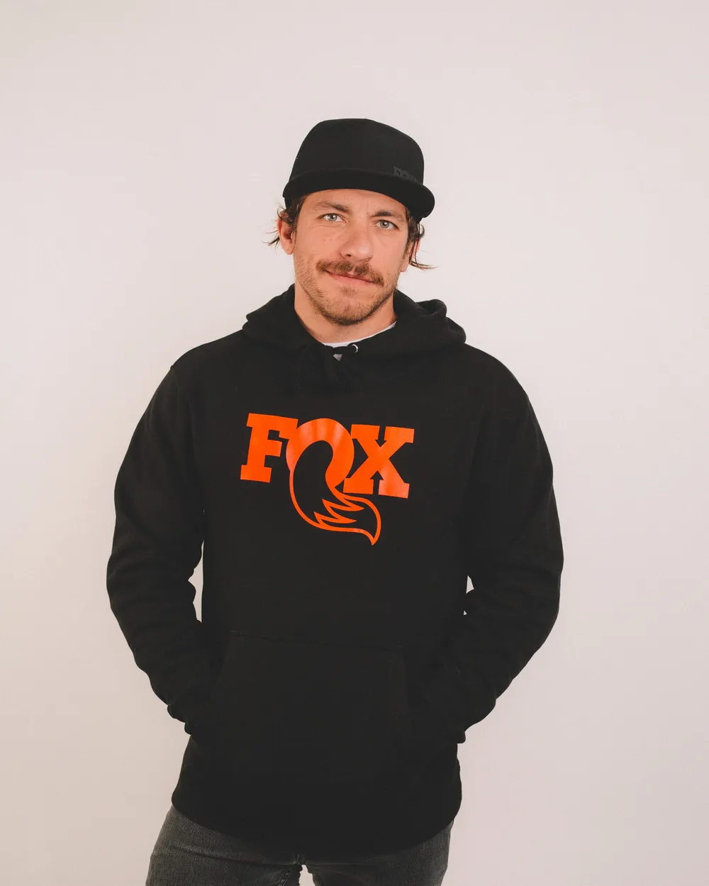 Fox black orange logo hood x black factory hat by anthem branding 2
