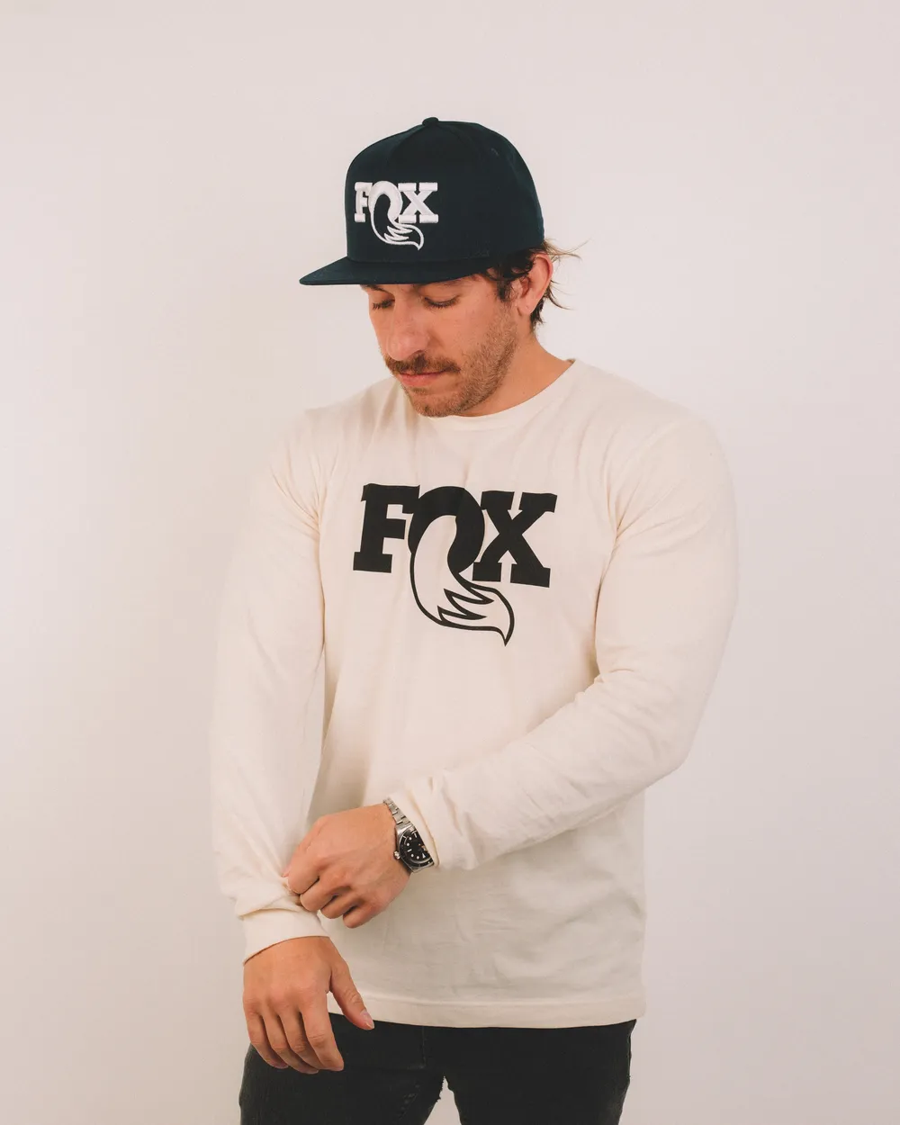 Fox natural black logo long sleeve tee x midnight blue logo hat by anthem branding 2