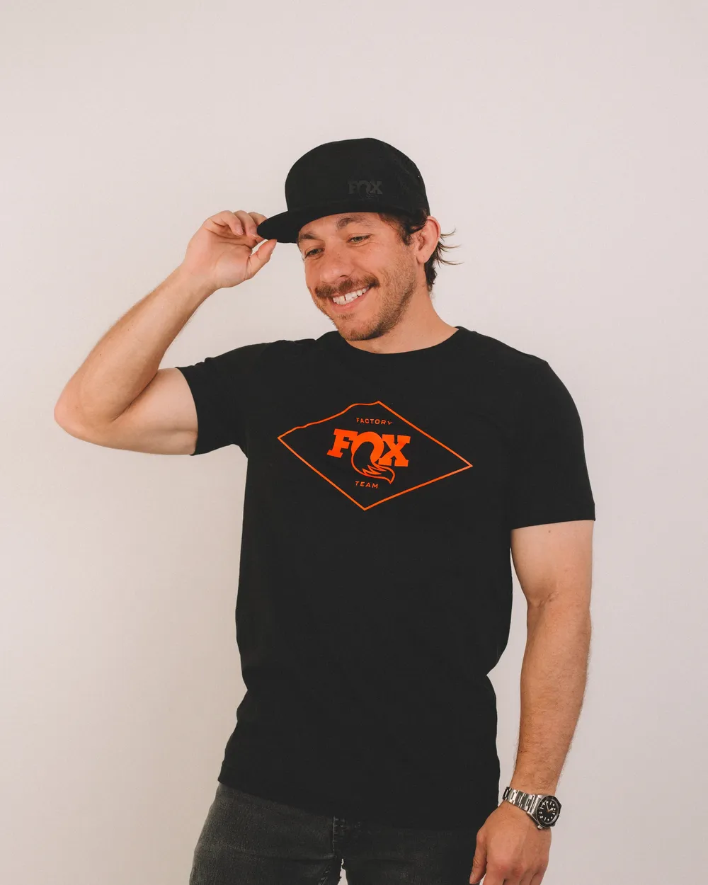Fox black orange throwback tee x black factory hat by anthem branding