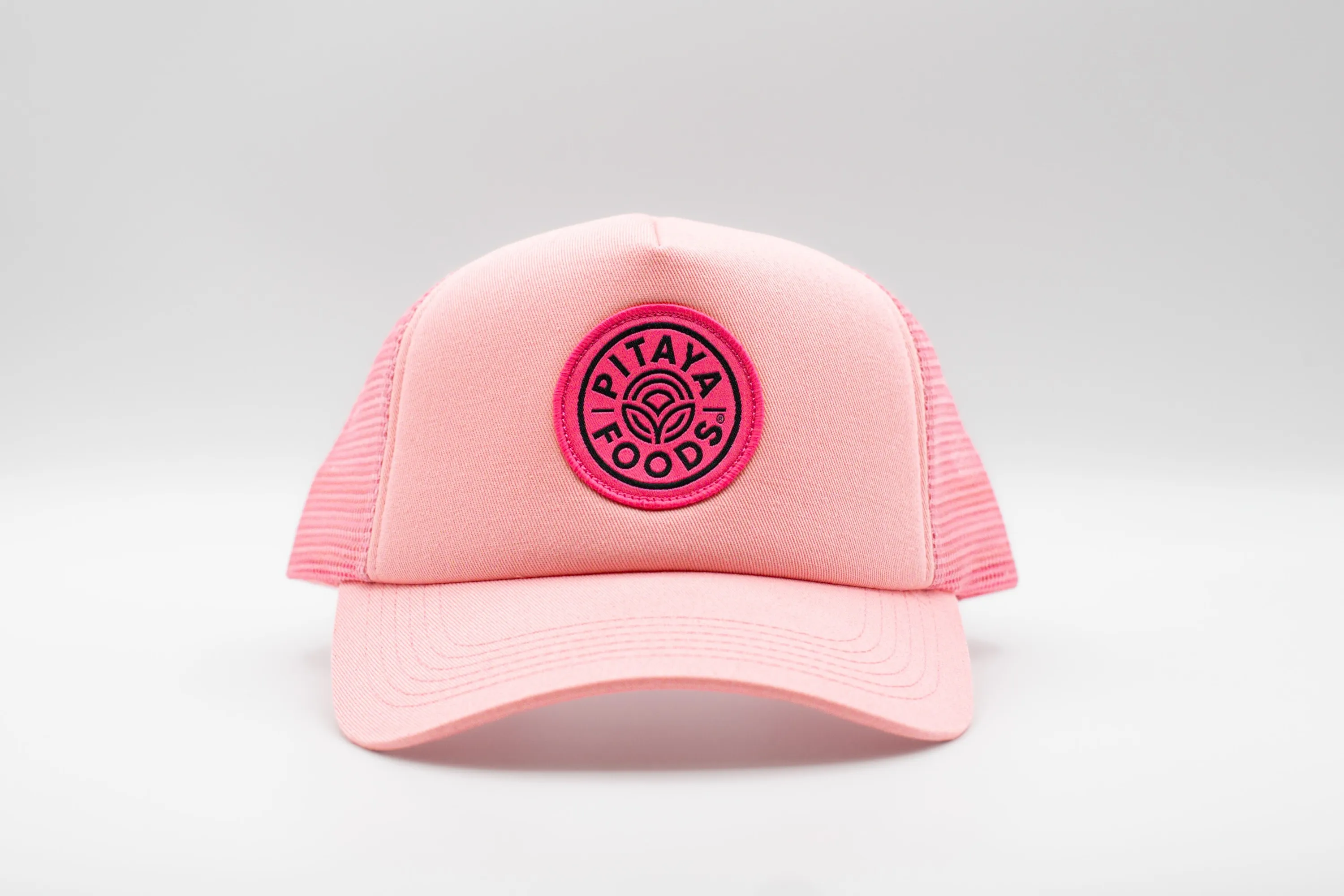 Pitaya foods pink trucker hat by anthem branding 1