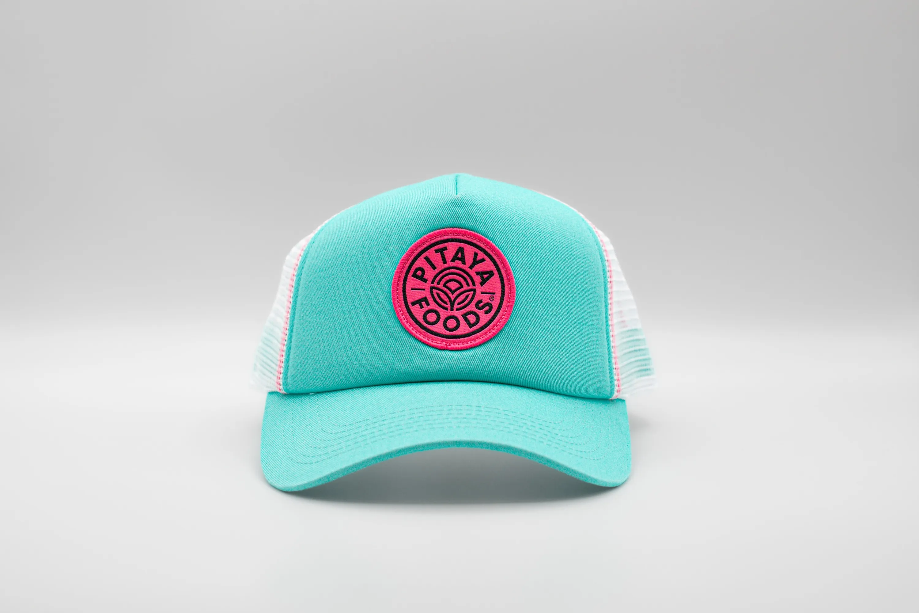 Pitaya foods turquoise trucker hat by anthem branding 1