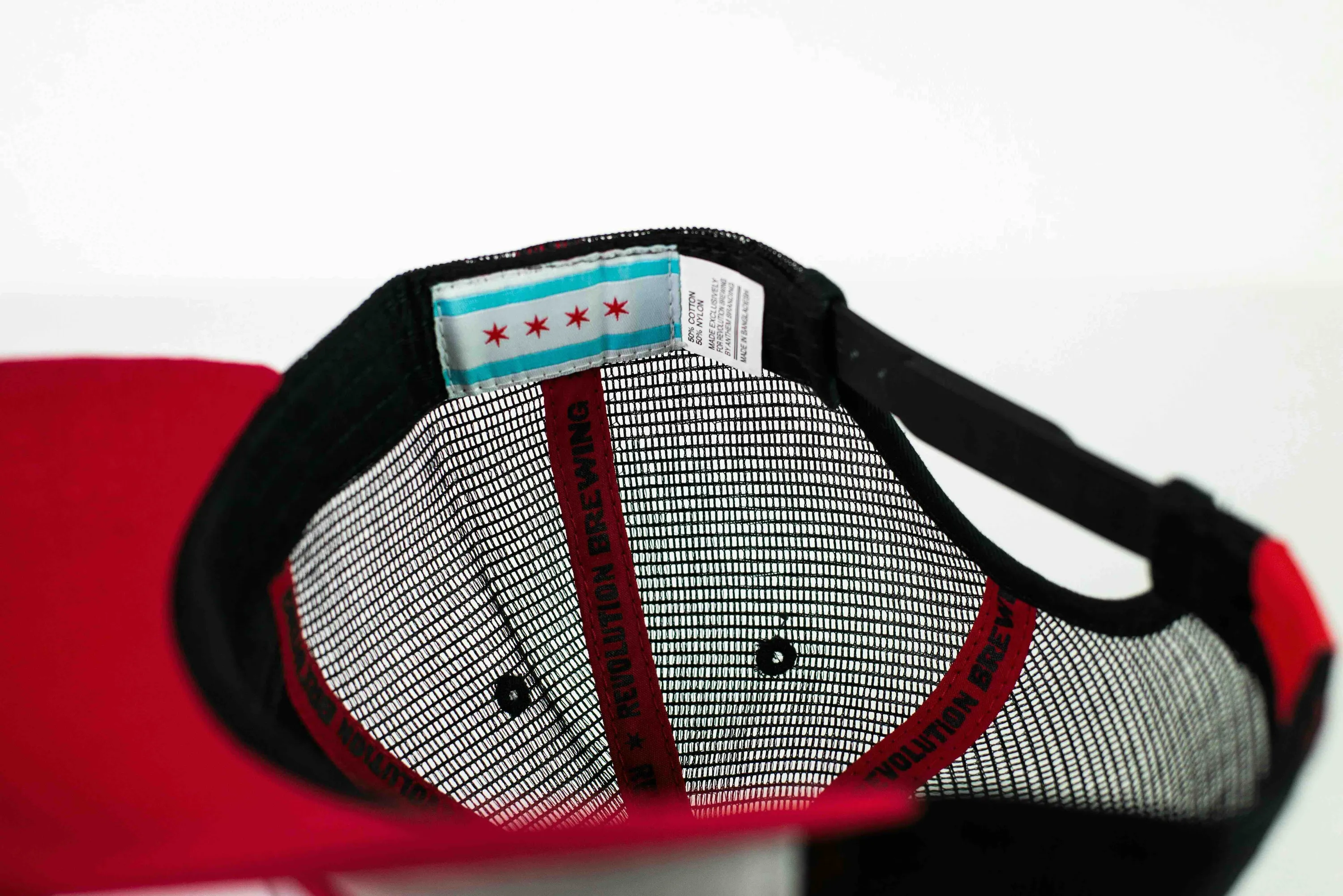 Curved Brim Trucker Hat Interior Details for Revolution Brewing by Anthem Branding