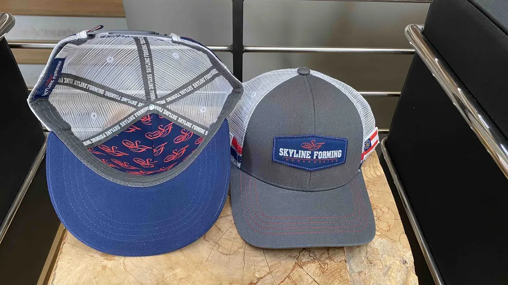 Custom trucker hats skyline forming Mableton anthem branding