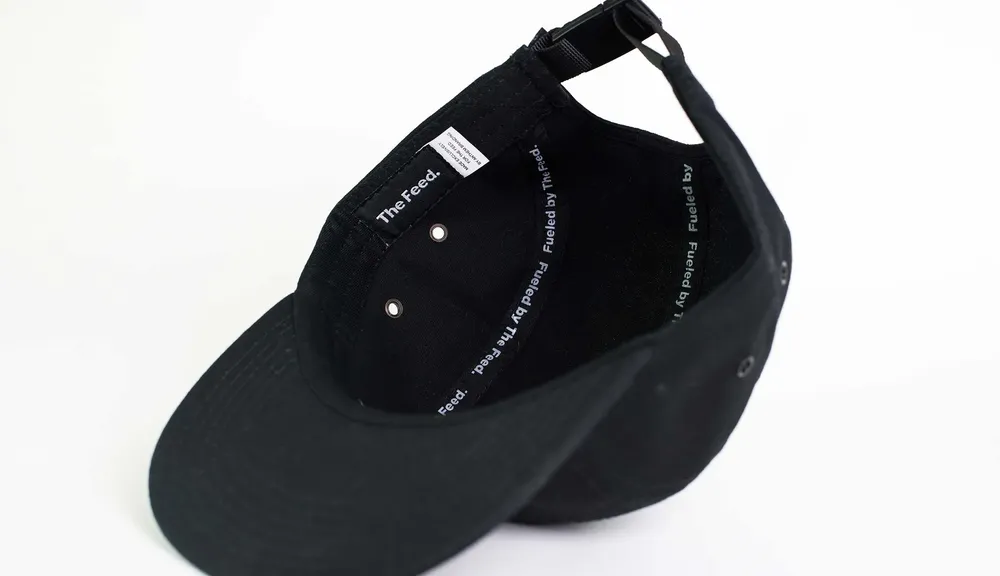 The Feed Camper Hat Black Interior Seams by Anthem Branding