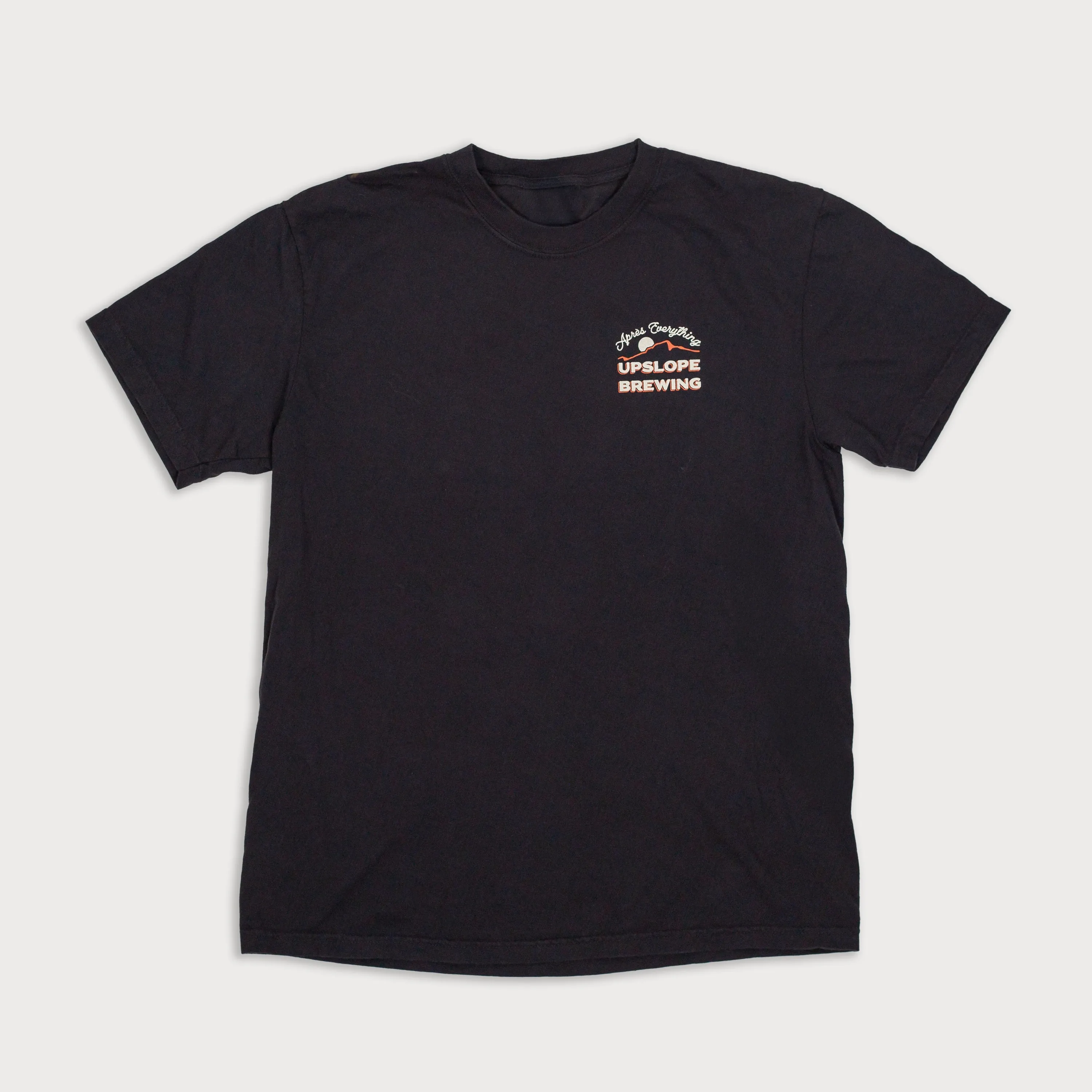 Upslope apres everything tee black front by anthem branding