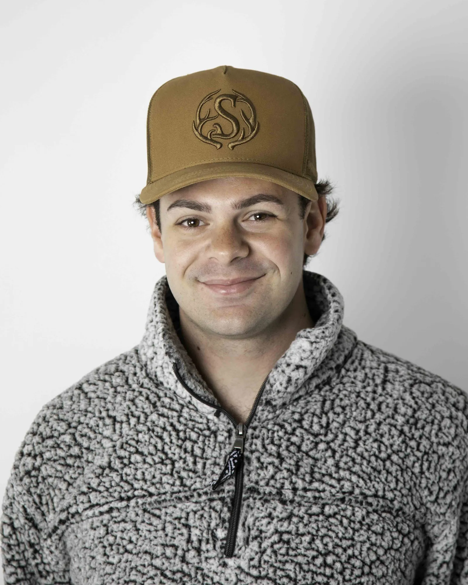 Trucker hats custom stitched stranahans anthem branding lifestyle 1