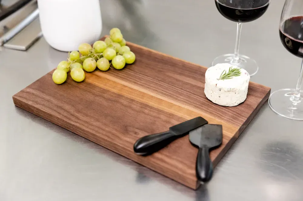 Custom walnut cutting board corporate sales anthem branding