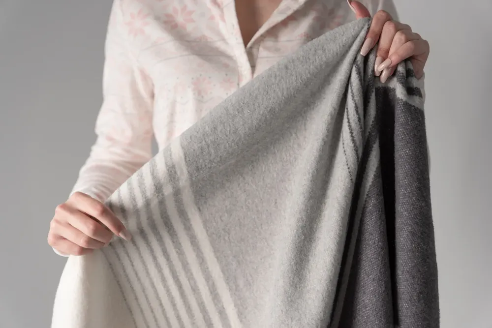 Capri Fringed Throw by anthem branding 2