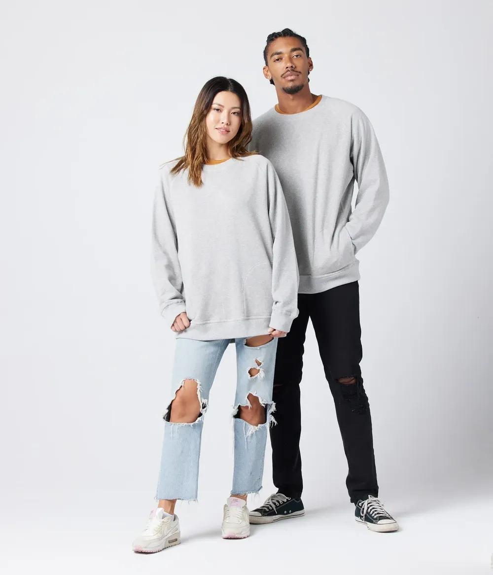 Known supply unisex pocket crewneck sweatshirt by anthem branding